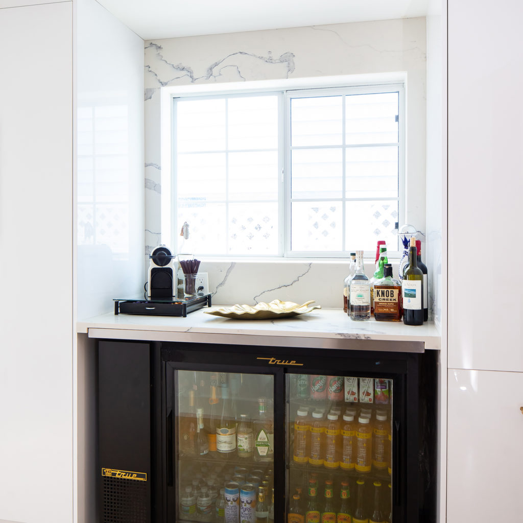 A functional and stylish bar area and fridge