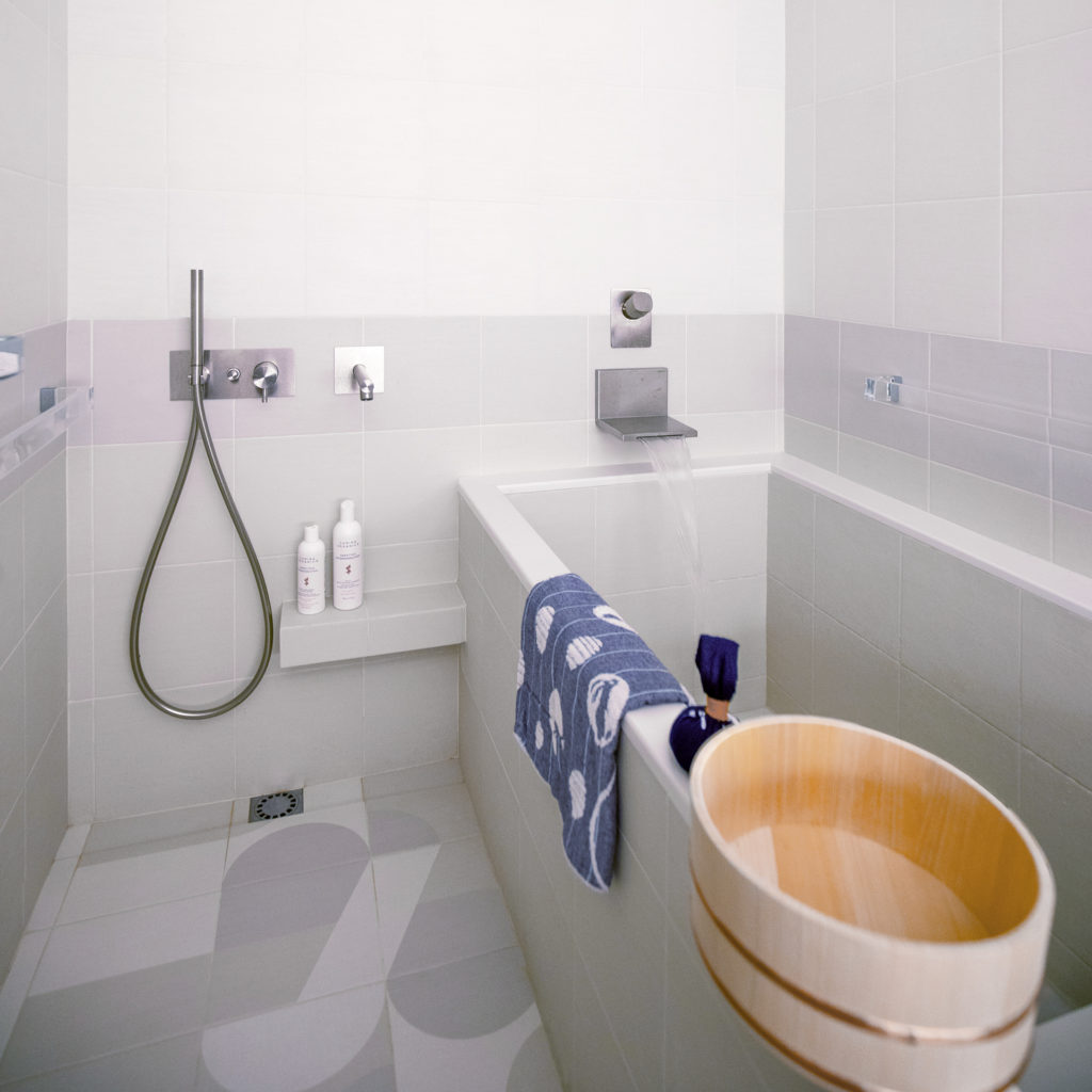 An onsen-style bathtub and shower