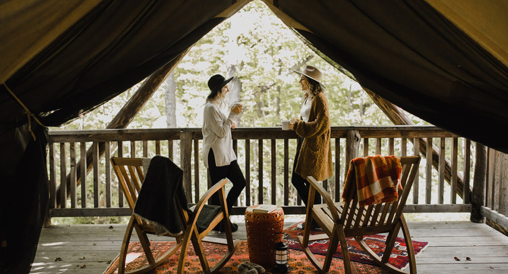 Coffee on the covered porch at Firelight Camps