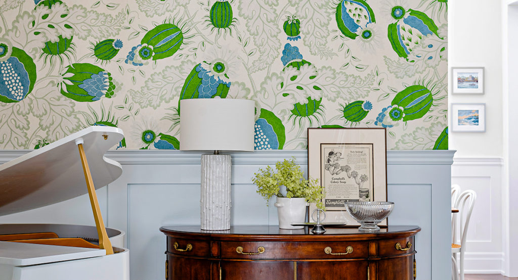 A living space defined by "Carnival" wallpaper by Christopher Farr Cloth