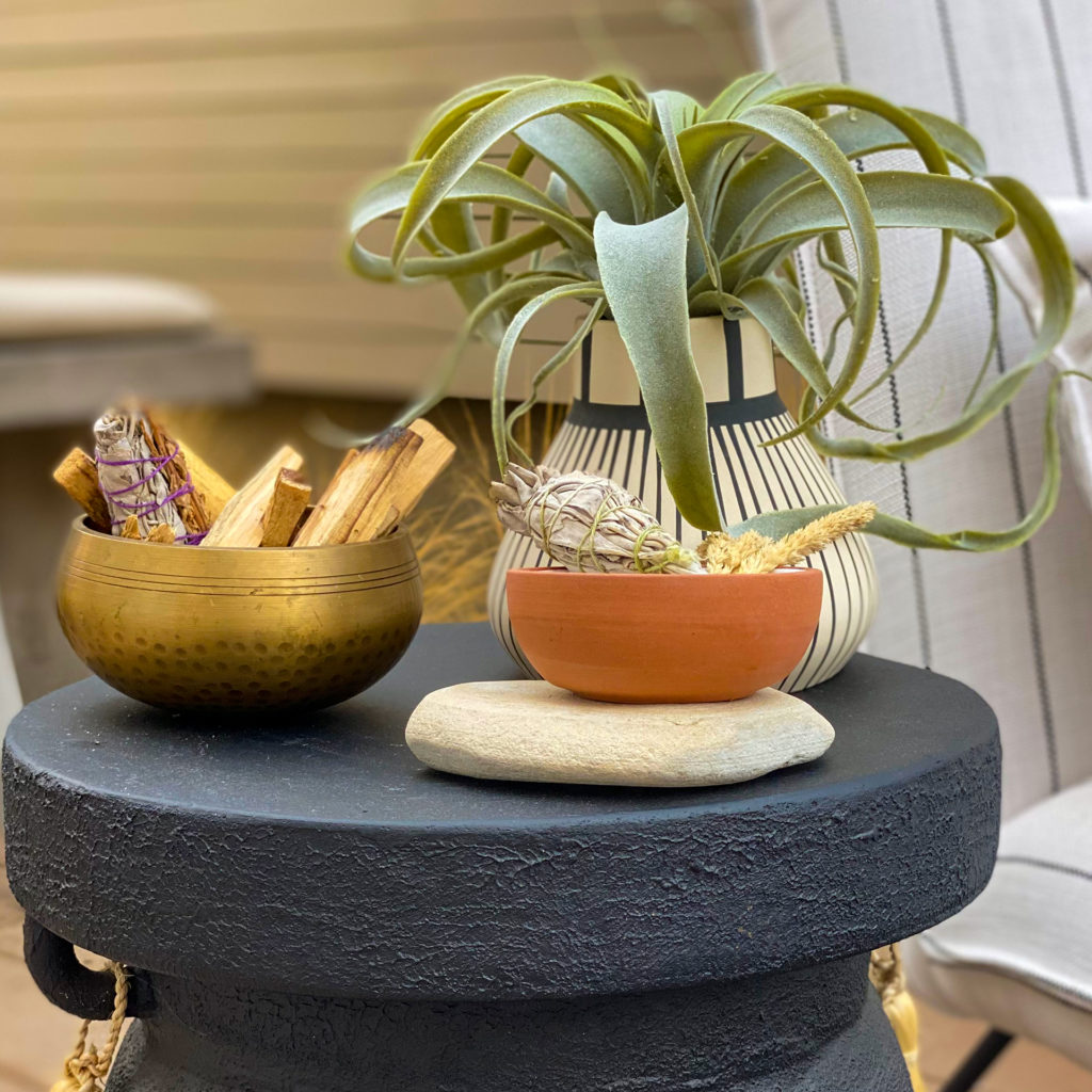 A black outdoor stool from Anthropologie