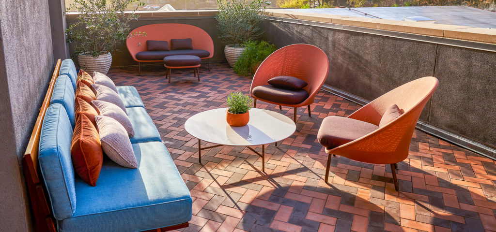 Custom outdoor sofas for premium suites at Hotel Magdalena in Austin