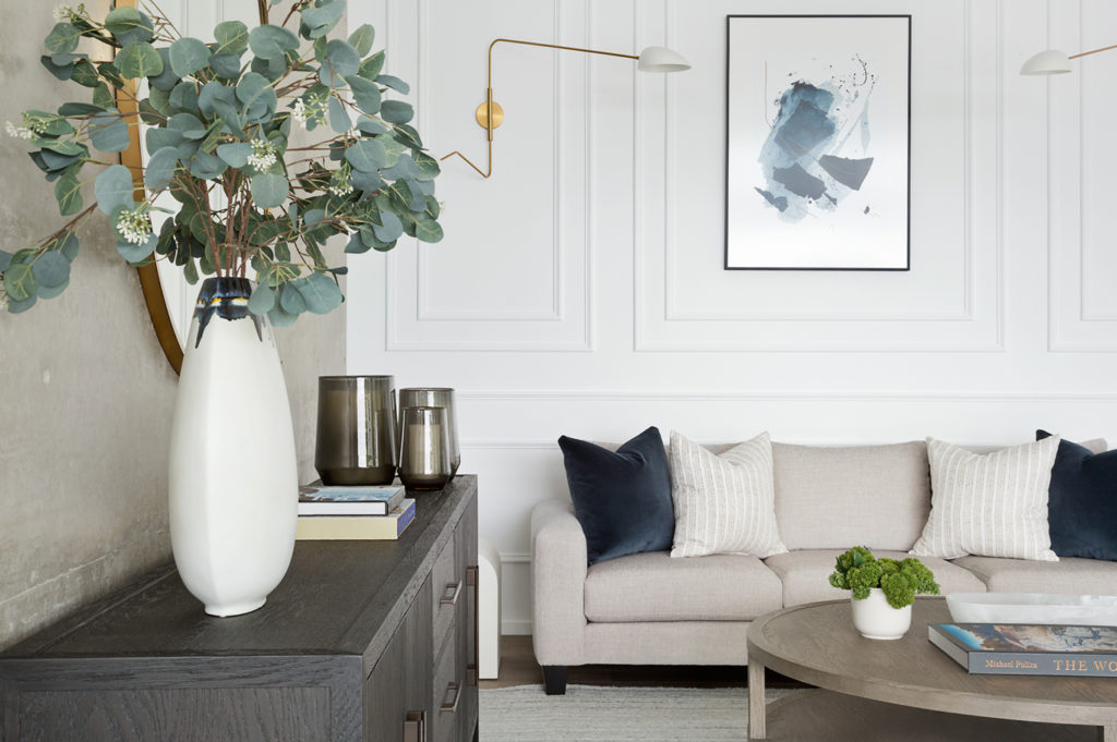 A family room in a calming palette designed by Evans