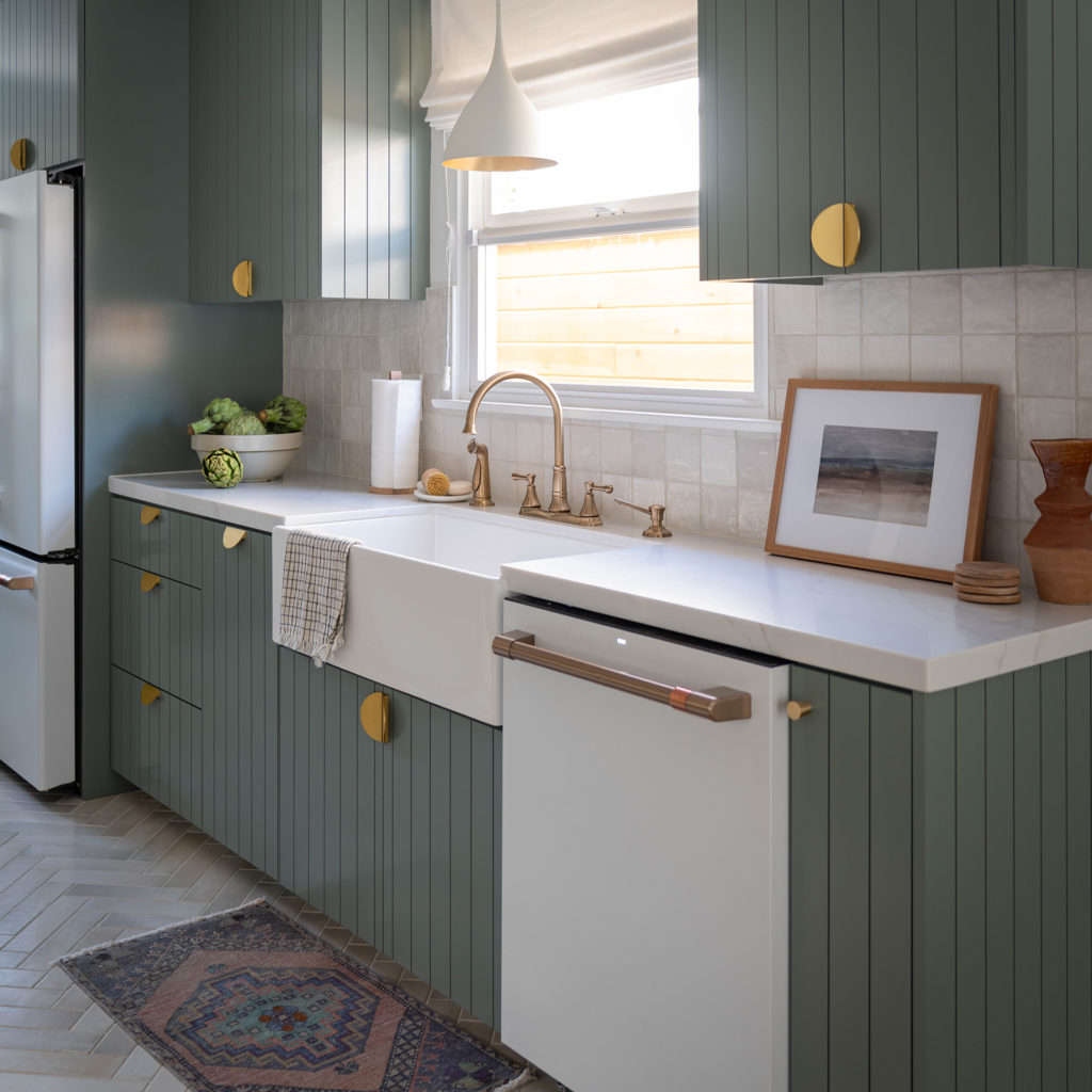 New cabinets with brass pulls and fixtures